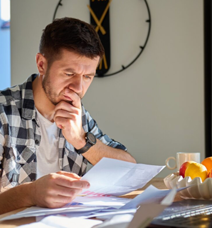 Man with Papers - Inner Banner Desktop.jpg